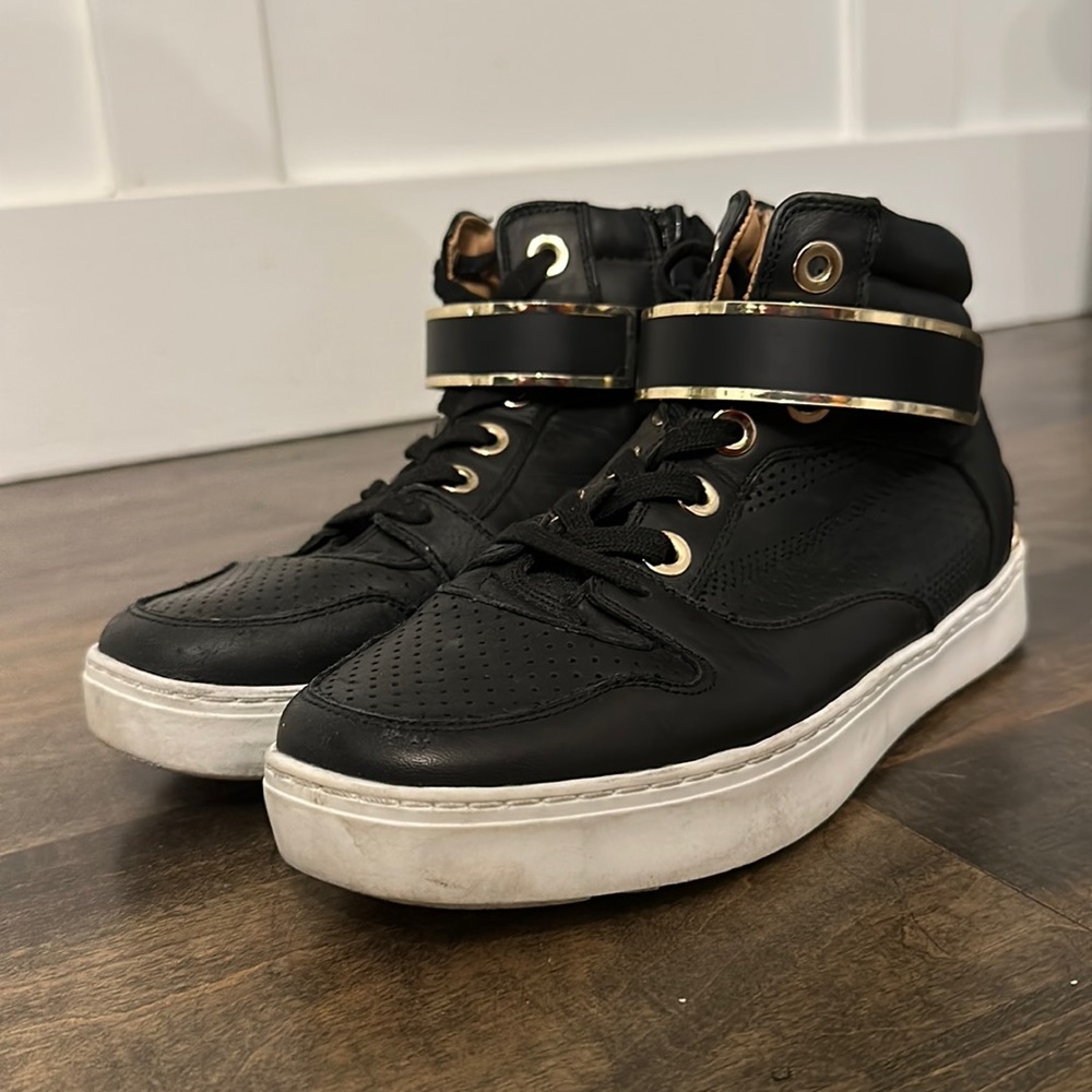 Women’s high top gold rim boots